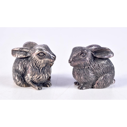 1160 - A PAIR OF CONTINENTAL SILVER RABBIT CONDIMENTS. 44.2 grams. 3.5 cm x 3 cm.