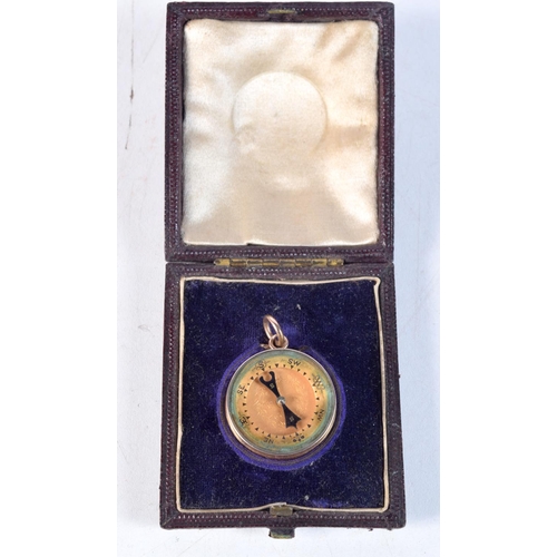 1179 - A RARE ANTIQUE YELLOW METAL MINIATURE COMPASS BAROMETER. 20.5 grams. 2.75 cm x 1.5 cm.