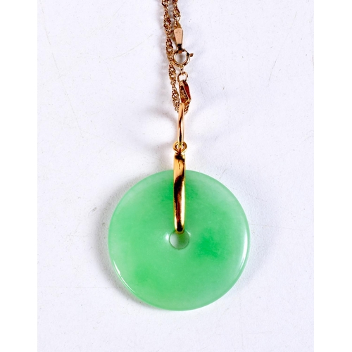 1180 - A 9CT GOLD JADEITE NECKLACE. 11.2 grams. Chain 45 cm long, pendant 3.5 cm x 3 cm.