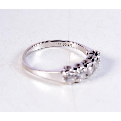 1192 - A 14CT GOLD AND CZ RING. 2.3 grams. N.