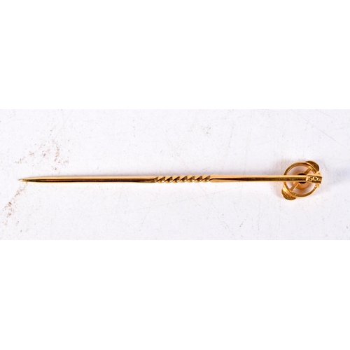 1217 - A VICTORIAN 15CT GOLD AND SAPPHIRE STICK PIN. 1 grams. 5.5 cm long.