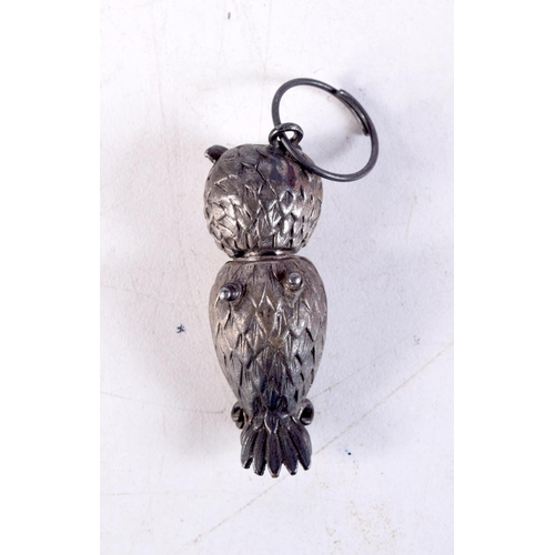 1234 - A SILVER OWL PENDANT. 14 grams. 4.5 cm x 1.5 cm.