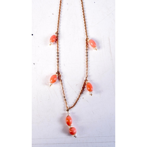 1270 - A 9CT GOLD CORAL AND PEARL NECKLACE. 12.3 grams. 55 cm long.