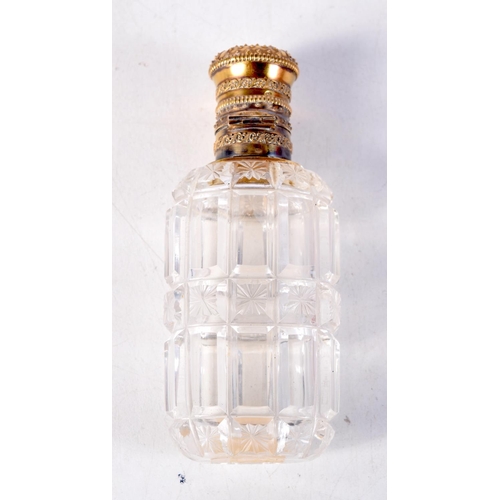 1297 - AN 18CT GOLD MOUNTED GLASS SCENT BOTTLE. 81 grams. 9.5 cm high.