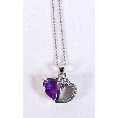 1301 - A WHITE METAL AND AMETHYST NECKLACE. 3.6 grams. 43 cm long, pendant 2 cm x 1.75 cm.