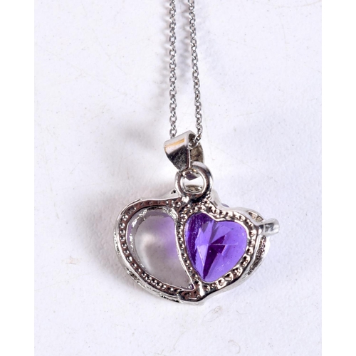 1301 - A WHITE METAL AND AMETHYST NECKLACE. 3.6 grams. 43 cm long, pendant 2 cm x 1.75 cm.