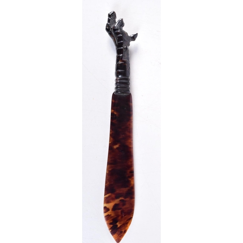 1306 - A RARE VICTORIAN CARVED TORTOISESHELL CLAW LETTER OPENER. 24 cm long.