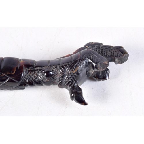 1306 - A RARE VICTORIAN CARVED TORTOISESHELL CLAW LETTER OPENER. 24 cm long.