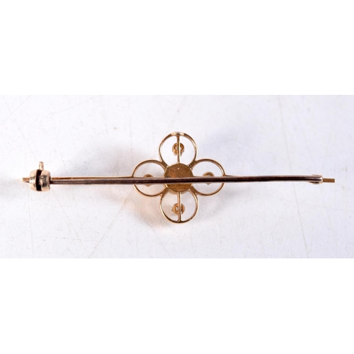 1322 - AN 18CT GOLD PEARL AND DIAMOND BROOCH. 3 grams. 5.25 cm long.