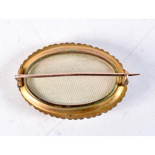 1332 - AN ANTIQUE 9CT GOLD AND PEARL BROOCH. 6.9 grams. 4 cm x 2.5 cm.