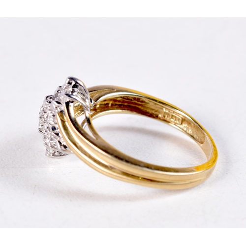 1343 - A 10CT GOLD AND DIAMOND CLUSTER RING. 2.9 grams. O.