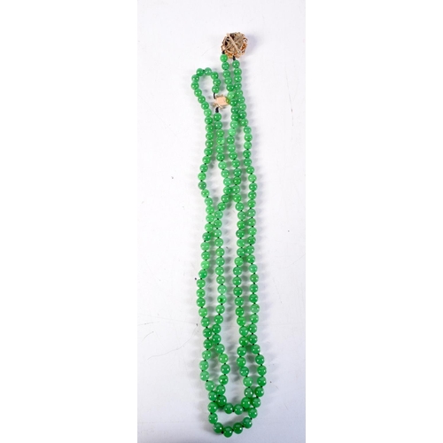 1357 - A 14CT GOLD DIAMOND AND JADEITE NECKLACE. 131 grams. 64 cm long.