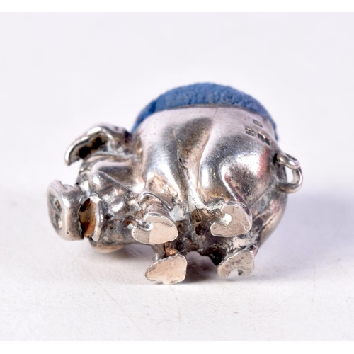 1361 - A RARE VICTORIAN MINIATURE PIG PIN CUSHION. London 1873. 12 grams. 2.75 cm x 2.25 cm.