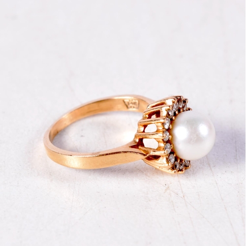 1395 - A 14CT GOLD PEARL AND DIAMOND RING. 2.5 grams. F.