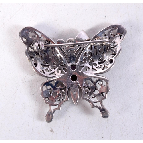 1397 - A SILVER AND AMETHYST BUTTERFLY BROOCH. 10.8 grams. 4 cm x 3.5 cm.