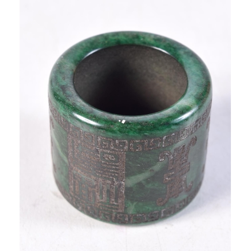 1437 - A CHINESE JADE ARCHERS RING. 39 grams. Z. 3 cm x 3.5 cm.