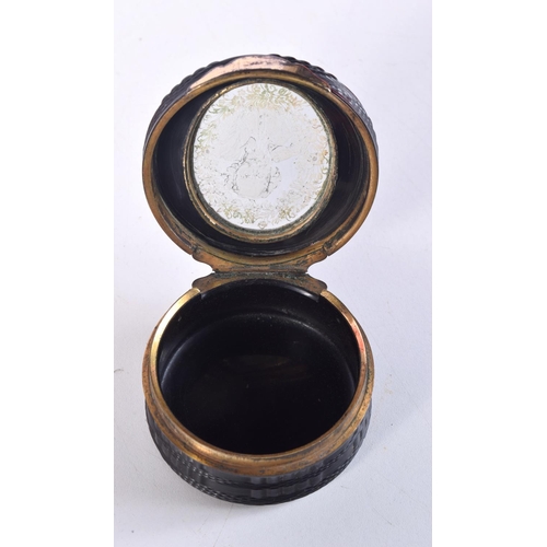 1464 - AN 18TH CENTURY CONTINENTAL PRESSED HORN SNUFF BOX. 7.5 cm diameter.