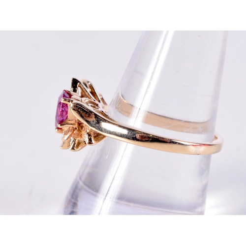 1486 - A 14CT GOLD RUBY AND DIAMOND RING. 3.7 grams. P.