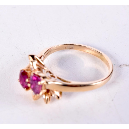 1486 - A 14CT GOLD RUBY AND DIAMOND RING. 3.7 grams. P.