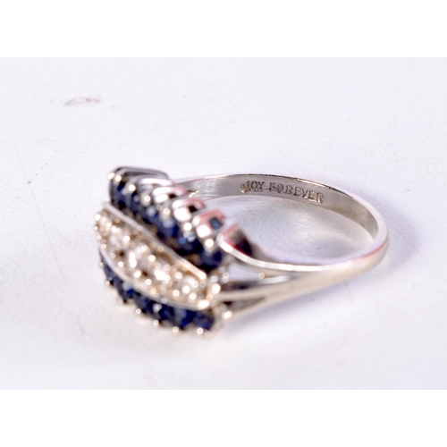 1493 - A 14CT GOLD DIAMOND AND SAPPHIRE RING. 4.1 grams. L/M.