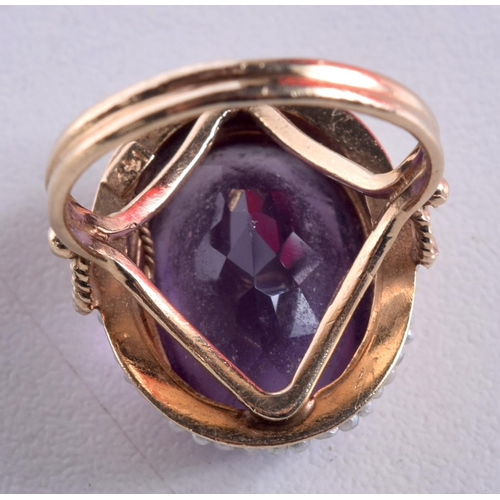 1497 - A GOLD AMETHYST AND PEARL RING. 5.2 grams. K.