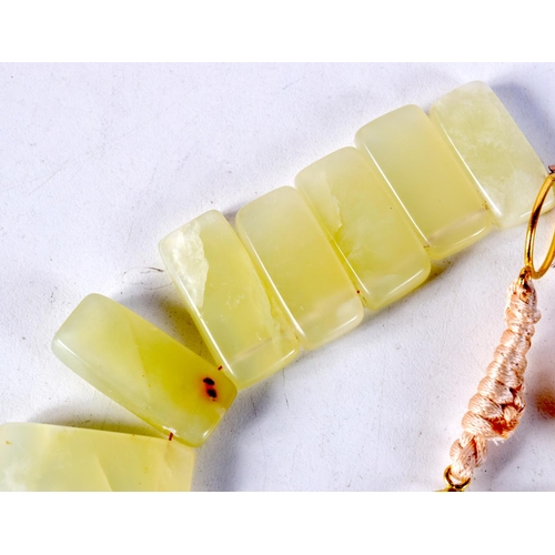 1512 - AN ONYX NECKLACE. 60 cm long.