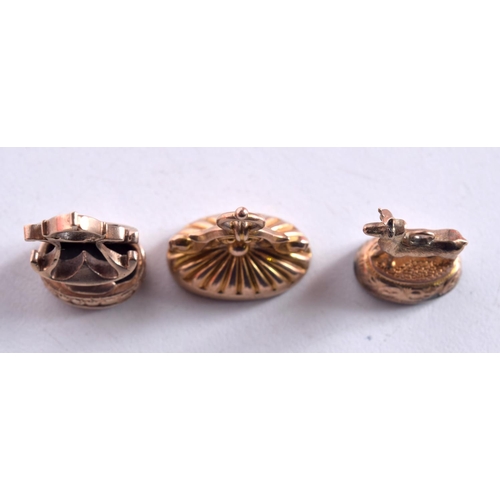 1535 - THREE ANTIQUE 9CT GOLD FOBS. 12.4 grams. Largest 3 cm x 1.5 cm. (3)