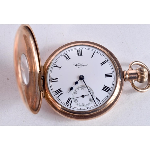 1543 - AN ANTIQUE YELLOW METAL HALF HUNTER POCKET WATCH. 5 cm wide.