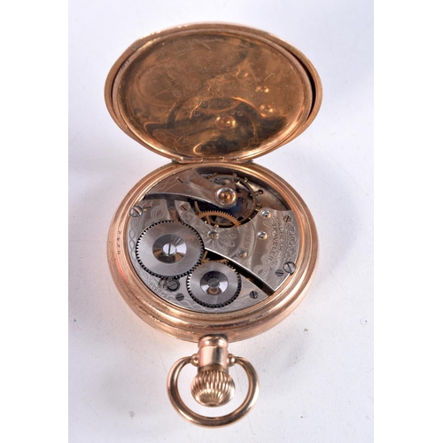 1543 - AN ANTIQUE YELLOW METAL HALF HUNTER POCKET WATCH. 5 cm wide.