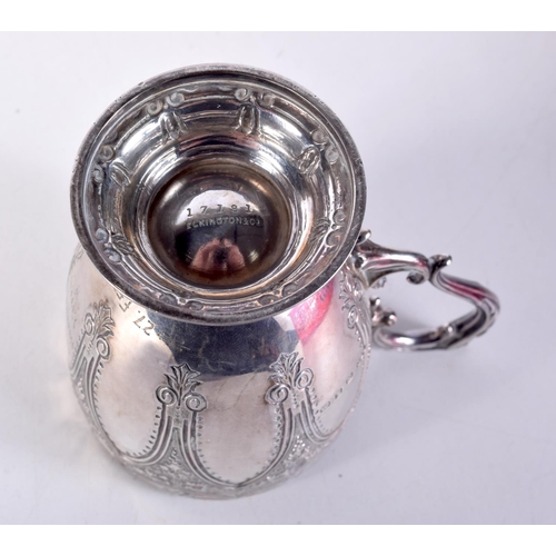 1547 - A VICTORIAN SILVER MUG. Birmingham 1899. 179.9 grams. 12 cm x 8 cm.