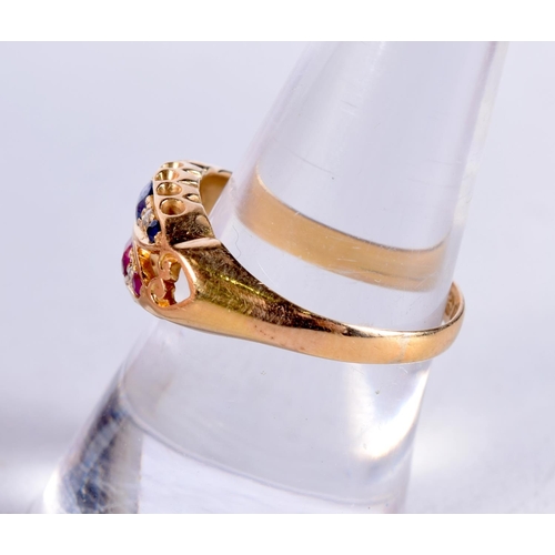 1569 - AN 18CT GOLD DIAMOND RUBY AND SAPPHIRE RING. 3.1 grams. O.