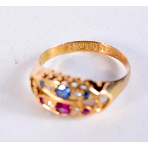 1569 - AN 18CT GOLD DIAMOND RUBY AND SAPPHIRE RING. 3.1 grams. O.