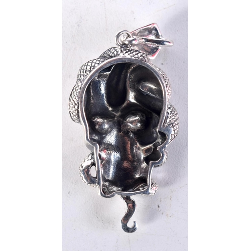 1574 - A SILVER SKULL PENDANT. 12.9 grams. 5.5 cm x 2.5 cm.