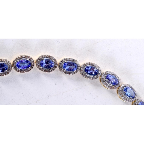 1578 - A 9CT GOLD DIAMOND AND TANZANITE BRACELET. 12 grams. 19 cm long.