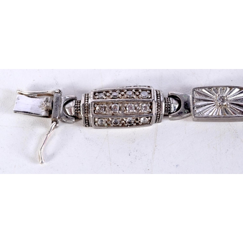 1588 - A SILVER AND CZ BRACELET. 44 grams. 23 cm long.