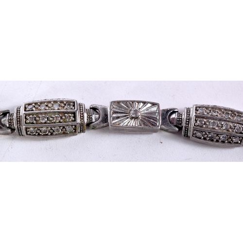 1588 - A SILVER AND CZ BRACELET. 44 grams. 23 cm long.