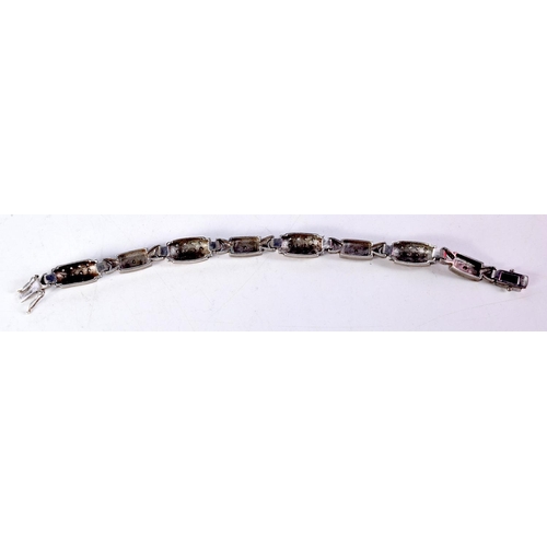 1588 - A SILVER AND CZ BRACELET. 44 grams. 23 cm long.