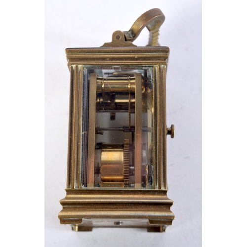 1612 - A MINIATURE ANTIQUE CARRIAGE CLOCK. 7.75 cm x 4 cm.