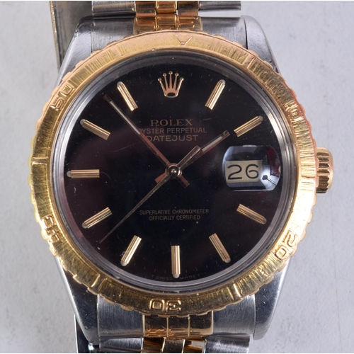 1618 - A GOOD ROLEX BLACK DIAL TWO TONE WRISTWATCH. 3.75 cm wide inc crown.