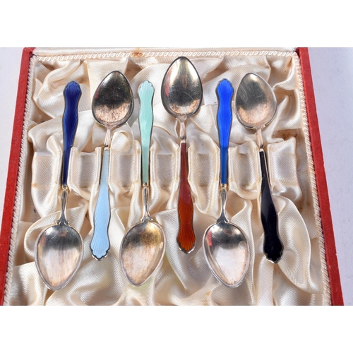 1646 - A SET OF NORWEGIAN SILVER AND ENAMEL SPOONS. 64 grams. 9.5 cm long. (6)