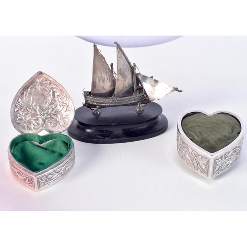 1674 - A CONTINENTAL SILVER BOAT together with two Indian silver boxes. 288 grams overall. Largest 9 cm x 7... 