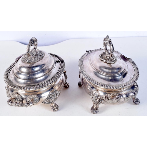 1677 - A PAIR OF EARLY 19TH CENTURY ENGLISH SILVER PLATED TUREENS AND COVERS. 1822 grams. 21 cm x 15.5 cm.