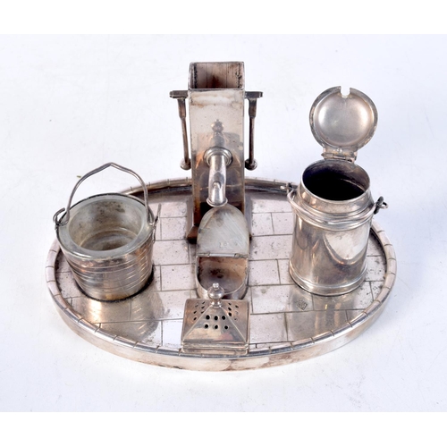 1682 - A NOVELTY SILVER PLATED INKSTAND. 450 grams overall. 12 cm x 15.5 cm.