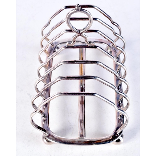 1687 - AN ART DECO SILVER TOAST RACK. 152 grams. 13 cm x 11.5 cm.