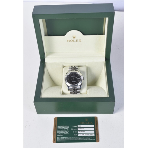 1704 - A ROLEX BLACK DIAL DATEJUST STAINLESS STEEL WRISTWATCH. 3.75 cm wide inc winder.