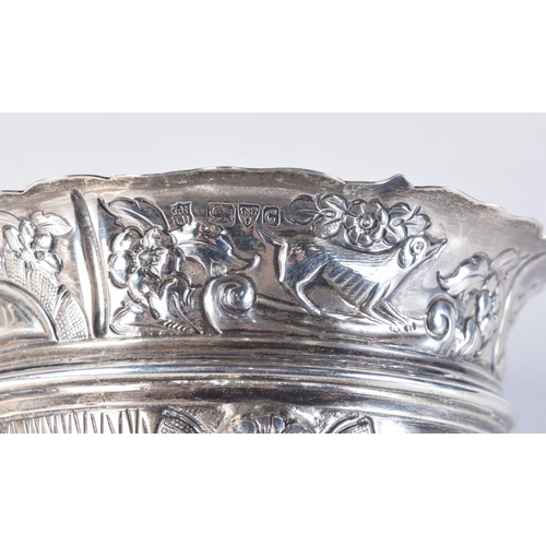 1707 - AN EDWARDIAN SILVER REPOUSSE SUGAR BOWL. Chester 1903. 171 grams. 11.5 cm x 6.5 cm.