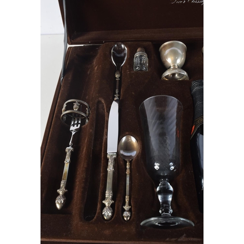 1711 - A CHRISTOPH WINDMANN SILVER CHAMPAGNE SET. 44 cm x 34 cm.