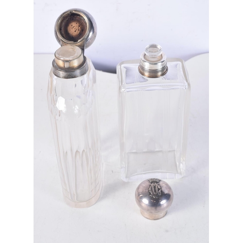 1725 - TWO SILVER TOPPED HIP FLASKS. Largest 18 cm x 8.5 cm. (2)