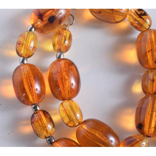 1743 - AN AMBER NECKLACE. 47 grams. 57 cm long.