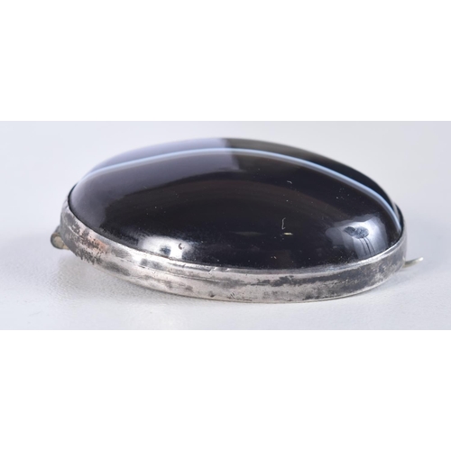 1744 - AN ANTIQUE BANDED AGATE SILVER BROOCH. 15 grams. 4 cm x 3 cm.